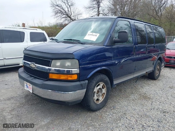 2004 Chevrolet Express Passenger with VIN 1GBFG15T441159106, listed as a IAAI auction lot 41999210 with 245,286 mi miles. Bid and sale history available at carsss.com. Image 2.