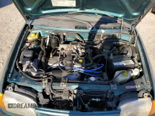 1996 Ford Aspire z VIN KNJLT06H0T6195551, wystawiony jako Copart lot #79450694 z przebiegiem 887 992 mil mil oraz Tytuł czysty. Historia ofert i sprzedaży dostępna na DreamBid. Obrazek 11.