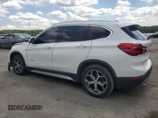 2018 BMW X1 xDrive28i with VIN WBXHT3C35J5F90062, listed as a Copart auction lot 56284945 with 138,137 mi miles and Salvage title. Bid and sale history available at DreamBid. Image 2.