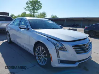 2018 Cadillac CT6 Luxury AWD z VIN 1G6KD5RS9JU151575, wystawiony jako IAAI lot #42078361 z przebiegiem 28 187 mil mil oraz . Historia ofert i sprzedaży dostępna na DreamBid. Obrazek 1.