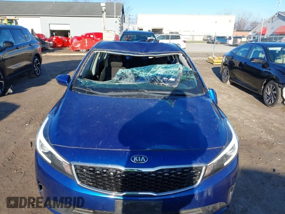 2017 Kia Forte LX with VIN 3KPFK4A76HE161141, listed as a IAAI auction lot 41856798 with 50,584 mi miles. Bid and sale history available at carsss.com. Image 6.