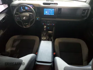 2023 Ford Bronco z VIN 1FMDE5BH2PLB20499, wystawiony jako Copart lot #62211165 z przebiegiem 28 372 mil mil oraz Szkoda całkowita • Salvage title. Historia ofert i sprzedaży dostępna na DreamBid. Obrazek 8.
