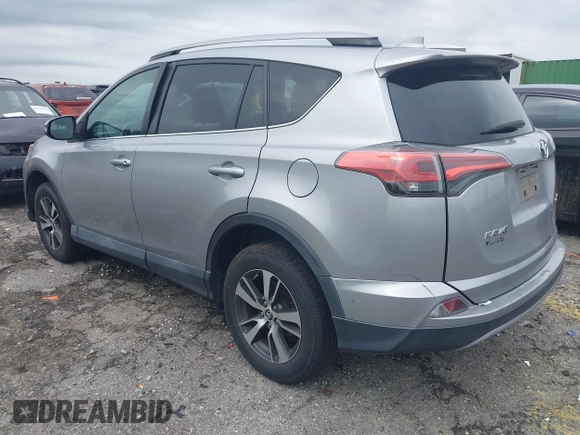 2018 Toyota RAV4 XLE with VIN 2T3WFREV4JW486939, listed as a IAAI auction lot 42355448 with 133,655 mi miles and . Bid and sale history available at DreamBid. Image 3.