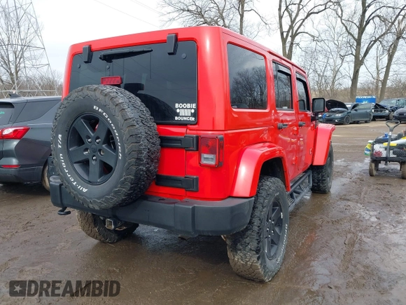 2015 Jeep Wrangler Unlimited Sahara with VIN 1C4BJWEG3FL590491, listed as a IAAI auction lot 41642219 with 148,759 mi miles. Bid and sale history available at carsss.com. Image 4.