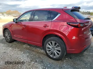 2023 Mazda CX-5 Signature with VIN JM3KFBXY4P0100652, listed as a Copart auction lot 82235664 with 29,344 mi miles and Salvage Title. Bid and sale history available at carsss.com. Image 2.