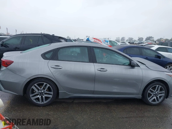 2023 Kia Forte GT-Line z VIN 3KPF54AD8PE602683, wystawiony jako IAAI lot #41444418 z przebiegiem 52 229 mil mil oraz . Historia ofert i sprzedaży dostępna na DreamBid. Obrazek 13.