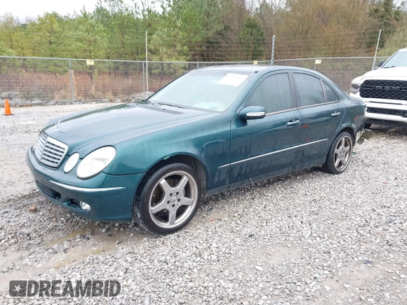 2003 Mercedes-Benz E-Class 3.2L with VIN WDBUF65J73A130214, listed as a IAAI auction lot 41731642 with 203,520 mi miles. Bid and sale history available at carsss.com. Image 2.