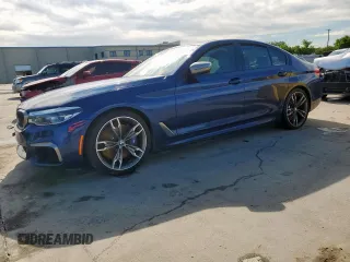 2020 BMW 5 Series M550i xDrive with VIN WBAJS7C09LCE06865, listed as a Copart auction lot 60140955 with Not provided miles and Salvage title. Bid and sale history available at DreamBid. Image 1.