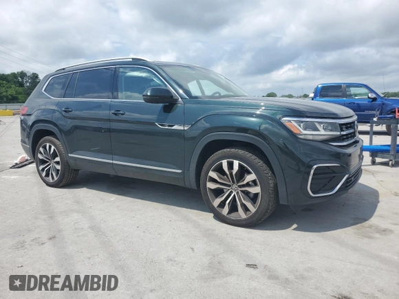2021 Volkswagen Atlas SEL Premium R-Line with VIN 1V2FR2CA1MC500123, listed as a Copart auction lot 56912575 with 57,054 mi miles and Salvage title. Bid and sale history available at DreamBid. Image 4.