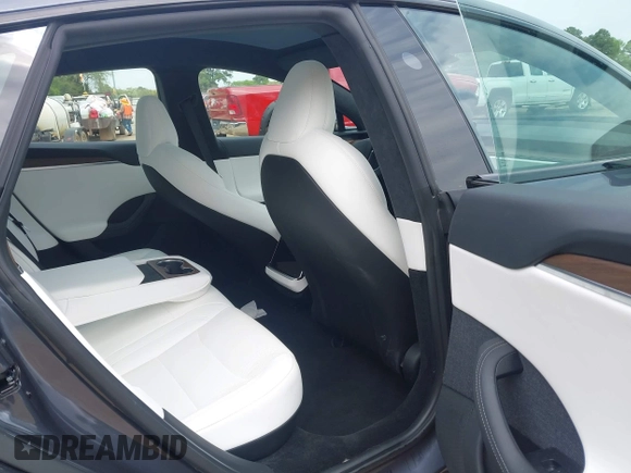 2023 Tesla Model S with VIN 5YJSA1E53PF511231, listed as a IAAI auction lot 41924626 with Not provided miles and . Bid and sale history available at DreamBid. Image 7.