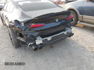 2020 BMW M8 with VIN WBSGV0C06LCD99264, listed as a IAAI auction lot 40276722 with 38,039 mi miles. Bid and sale history available at carsss.com. Image 6.