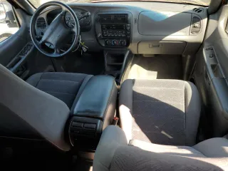 1999 Ford Explorer XLT с VIN 1FMZU35P0XZB52784, выставлен на аукционе Copart как лот 47563025 с пробегом 89 669 миль миль и Списание • Salvage title. История ставок и продаж доступна на DreamBid. Изображение 8.