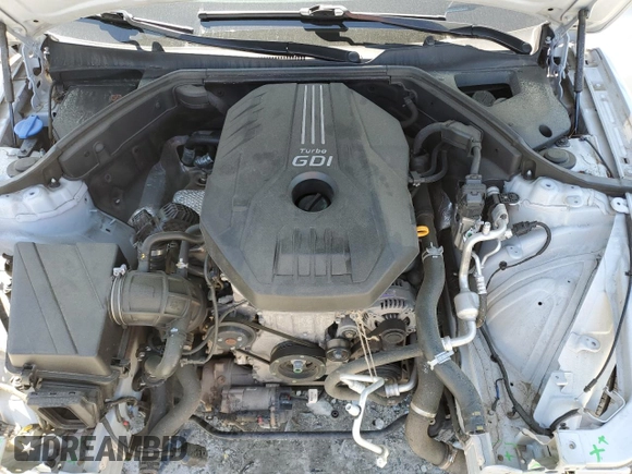 2022 Genesis G70 2.0T z VIN KMTG34TA0NU089619, wystawiony jako Copart lot #52154495 z przebiegiem 70 890 mil mil oraz Szkody całkowita. Historia ofert i sprzedaży dostępna na DreamBid. Obrazek 13.