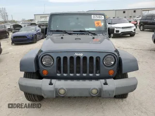 2007 Jeep Wrangler Unlimited Sahara z VIN 1J4GB59147L165439, wystawiony jako Copart lot #50794065 z przebiegiem 255 385 mil mil oraz Szkoda całkowita • Salvage title. Historia ofert i sprzedaży dostępna na DreamBid. Obrazek 5.