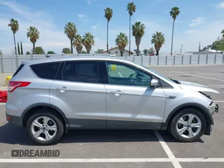 2015 Ford Escape SE with VIN 1FMCU9G93FUA26339, listed as a IAAI auction lot 42039281 with 185,729 mi miles and . Bid and sale history available at DreamBid. Image 14.