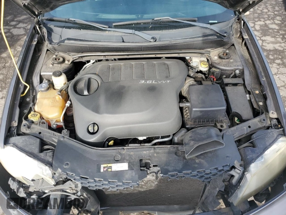 2014 Dodge Avenger SXT with VIN 1C3CDZCG1EN181798, listed as a Copart auction lot 52120655 with 156,472 mi miles and Salvage title. Bid and sale history available at DreamBid. Image 11.