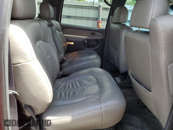 2002 Chevrolet Suburban LS with VIN 3GNEC16Z62G333723, listed as a Copart auction lot 59949255 with 151,548 mi miles and Salvage title. Bid and sale history available at DreamBid. Image 11.