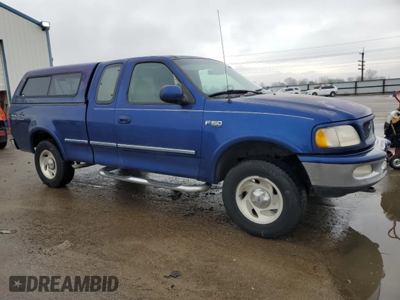 1997 Ford F-150 XL with VIN 1FTDX18W3VKC25911, listed as a Copart auction lot 44074305 with 184,409 mi miles and Salvage Title. Bid and sale history available at carsss.com. Image 4.