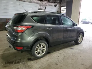 2018 Ford Escape SE z VIN 1FMCU9GD7JUA68705, wystawiony jako Copart lot #58275145 z przebiegiem 200 695 mil mil oraz Tytuł czysty. Historia ofert i sprzedaży dostępna na DreamBid. Obrazek 3.