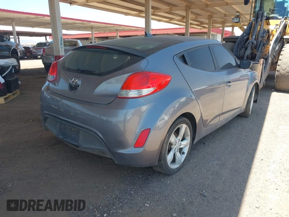 2014 Hyundai Veloster RE:FLEX z VIN KMHTC6AD2EU197984, wystawiony jako IAAI lot #41721931 z przebiegiem 107 252 mil mil oraz . Historia ofert i sprzedaży dostępna na DreamBid. Obrazek 4.
