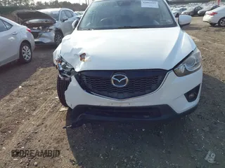 2014 Mazda CX-5 Grand Touring with VIN JM3KE4DY7E0425201, listed as a IAAI auction lot 41803597 with 118,867 mi miles. Bid and sale history available at carsss.com. Image 13.