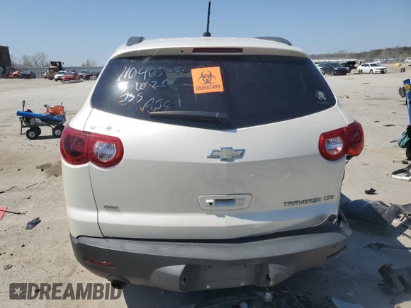 2012 Chevrolet Traverse LTZ z VIN 1GNKVLED1CJ170106, wystawiony jako Copart lot #52022235 z przebiegiem Nie podano mil oraz Szkoda całkowita • Salvage title. Historia ofert i sprzedaży dostępna na DreamBid. Obrazek 6.