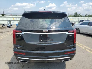 2023 Cadillac XT6 AWD Premium Luxury z VIN 1GYKPFRS7PZ225950, wystawiony jako Copart lot #65573174 z przebiegiem Nie podano mil oraz Szkoda całkowita • Salvage title. Historia ofert i sprzedaży dostępna na DreamBid. Obrazek 6.