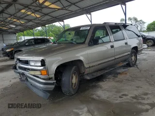 1999 Chevrolet Suburban with VIN 3GNEC16R1XG164265, listed as a Copart auction lot 58345065 with 267,054 mi miles and Salvage title. Bid and sale history available at DreamBid. Image 1.