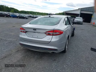 2017 Ford Fusion SE z VIN 3FA6P0HD8HR126511, wystawiony jako IAAI lot #42192296 z przebiegiem Nie podano mil oraz . Historia ofert i sprzedaży dostępna na DreamBid. Obrazek 16.