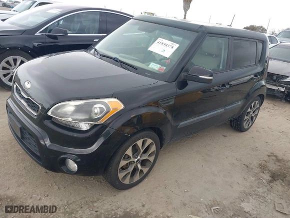 2013 Kia Soul + with VIN KNDJT2A60D7484792, listed as a IAAI auction lot 41830378 with 104,328 mi miles. Bid and sale history available at carsss.com. Image 2.