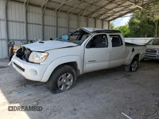 2005 Toyota Tacoma with VIN 3TMMU52N65M001833, listed as a Copart auction lot 62111395 with Not provided miles and Salvage title. Bid and sale history available at DreamBid. Image 1.