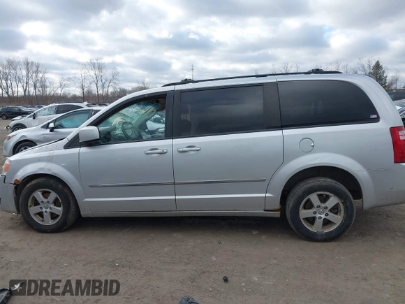 2010 Dodge Grand Caravan SXT with VIN 2D4RN5D13AR180609, listed as a IAAI auction lot 41857215 with Not Provided miles and . Bid and sale history available at DreamBid. Image 14.