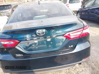 2019 Toyota Camry LE z VIN 4T1B11HK0KU759885, wystawiony jako IAAI lot #41684709 z przebiegiem 80 417 mil mil oraz . Historia ofert i sprzedaży dostępna na DreamBid. Obrazek 16.