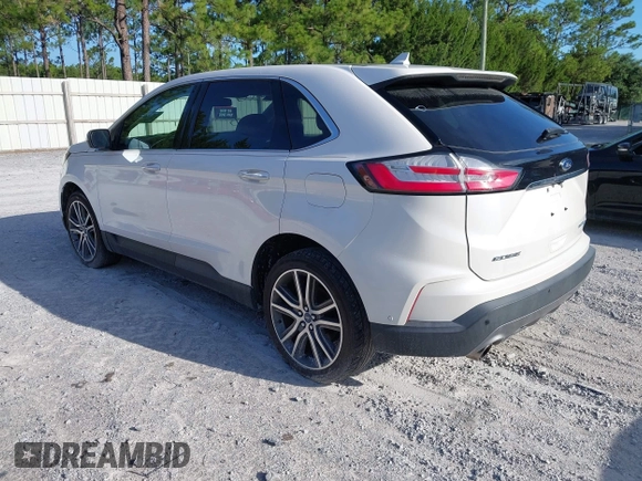 2019 Ford Edge Titanium with VIN 2FMPK3K95KBB34764, listed as a IAAI auction lot 42719541 with 128,028 mi miles and . Bid and sale history available at DreamBid. Image 3.
