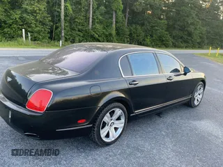 2007 Bentley Flying Spur с VIN SCBBR93W17C042658, выставлен на аукционе Copart как лот 62427535 с пробегом 97 393 миль миль и Списание • Salvage title. История ставок и продаж доступна на DreamBid. Изображение 4.