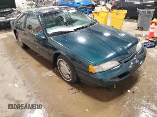 1995 Ford Thunderbird LX with VIN 1FALP62W8SH205542, listed as a Copart auction lot 47741815 with 128,401 mi miles and Clean Title. Bid and sale history available at DreamBid. Image 4.