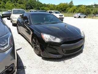 2013 Hyundai Genesis Coupe Premium z VIN KMHHT6KD2DU080165, wystawiony jako IAAI lot #42560439 z przebiegiem 155 246 mil mil oraz . Historia ofert i sprzedaży dostępna na DreamBid. Obrazek 1.