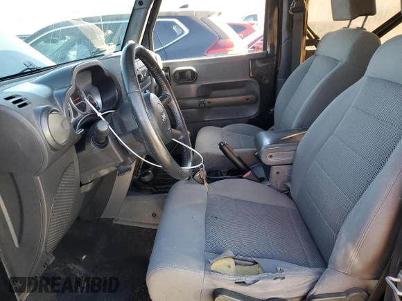 2009 Jeep Wrangler Rubicon with VIN 1J4GA64129L722366, listed as a Copart auction lot 87184064 with 210,988 mi miles and Clean Title. Bid and sale history available at DreamBid. Image 7.