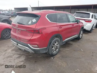 2019 Hyundai Santa Fe SE with VIN 5NMS2CAD5KH091985, listed as a IAAI auction lot 41471160 with 120,951 mi miles. Bid and sale history available at carsss.com. Image 4.