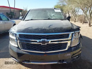 2020 Chevrolet Suburban LT with VIN 1GNSKHKC5LR303081, listed as a IAAI auction lot 41896511 with 60,121 mi miles and . Bid and sale history available at DreamBid. Image 11.