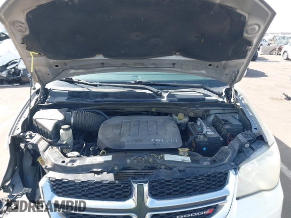 2013 Dodge Grand Caravan SXT with VIN 2C4RDGCG3DR600651, listed as a IAAI auction lot 41947769 with 201,824 mi miles and . Bid and sale history available at DreamBid. Image 10.