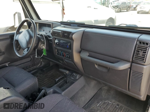 2002 Jeep Wrangler X with VIN 1J4FA39S32P708163, listed as a Copart auction lot 69703254 with 119,843 mi miles and Salvage Title. Bid and sale history available at carsss.com. Image 8.