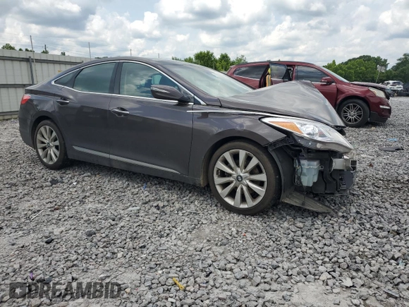 2015 Hyundai Azera Limited with VIN KMHFH4JG2FA479364, listed as a Copart auction lot 60598665 with 145,785 mi miles and Salvage title. Bid and sale history available at DreamBid. Image 4.