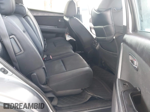 2015 Mazda CX-9 Sport with VIN JM3TB2BA0F0447436, listed as a IAAI auction lot 42480482 with 127,557 mi miles and . Bid and sale history available at DreamBid. Image 8.