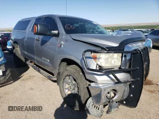2008 Toyota Tundra with VIN 5TFBV54128X056518, listed as a Copart auction lot 55415185 with 171,326 mi miles and Salvage title. Bid and sale history available at DreamBid. Image 4.