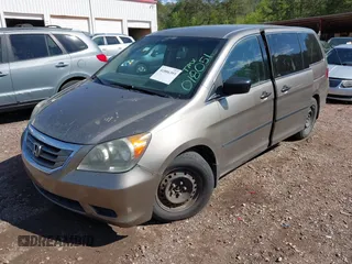 2010 Honda Odyssey LX with VIN 5FNRL3H25AB018051, listed as a IAAI auction lot 41886393 with 256,554 mi miles. Bid and sale history available at carsss.com. Image 2.