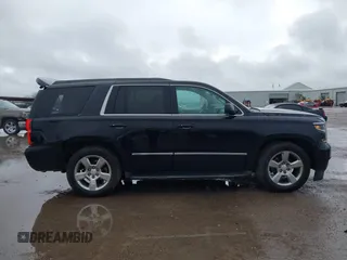 2015 Chevrolet Tahoe LT with VIN 1GNSCBKC2FR632139, listed as a IAAI auction lot 41553087 with 142,775 mi miles and . Bid and sale history available at DreamBid. Image 13.