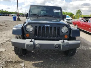 2007 Jeep Wrangler Unlimited Sahara with VIN 1J4GA59197L121262, listed as a Copart auction lot 61551685 with 233,309 mi miles and Clean title. Bid and sale history available at DreamBid. Image 5.