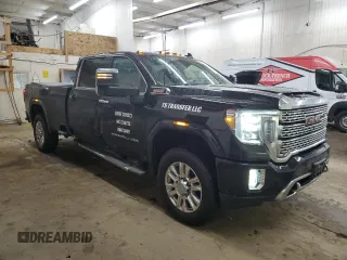 2020 GMC Sierra 3500HD Denali z VIN 1GT49WEY3LF279387, wystawiony jako Copart lot #84054454 z przebiegiem 140 648 mil mil oraz Szkoda całkowita • Salvage title. Historia ofert i sprzedaży dostępna na DreamBid. Obrazek 4.