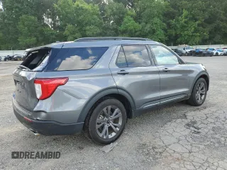2023 Ford Explorer XLT with VIN 1FMSK7DH1PGC12480, listed as a Copart auction lot 61403655 with 20,555 mi miles and Salvage title. Bid and sale history available at DreamBid. Image 3.